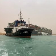 Suez Canal steps up efforts to remove blockage as shipping rates surge, tankers diverted away