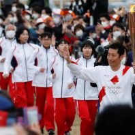 The Tokyo Olympics torch relay resumed after a year delay due to COVID