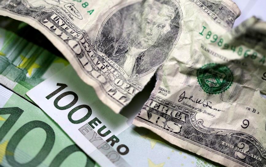 Dollar edges up as markets wait for U.S. inflation data