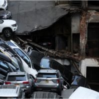 Manhattan parking garage collapse kills one, injures five.