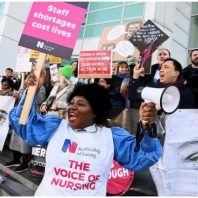 UK will halt nurses' strike if union doesn't defend legal action.