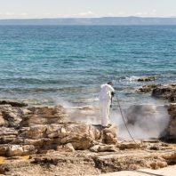 Croatia clears mystery clumps of oil from beaches before tourists arrive