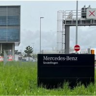 Two died in Mercedes factory shooting; man apprehended.