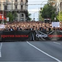 Serbians protest brutality following two mass killings.