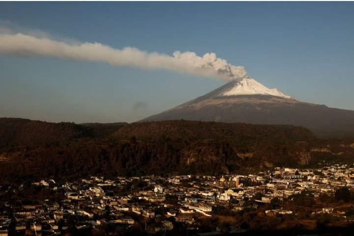 Mexico's capital volcano spews more ash, closing schools.