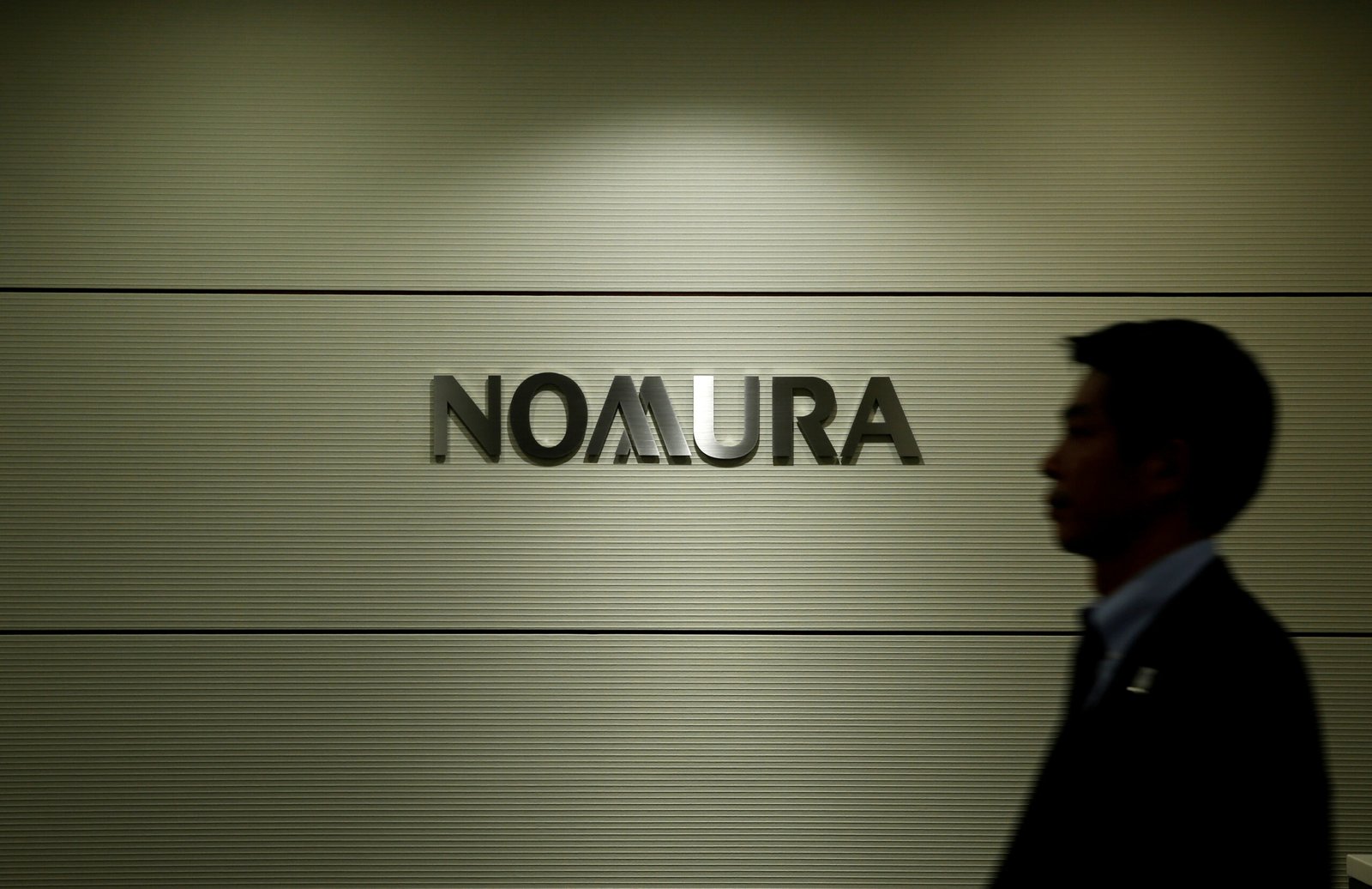 china-bans-nomura-senior-investment-banker-from-leaving-mainland-sources