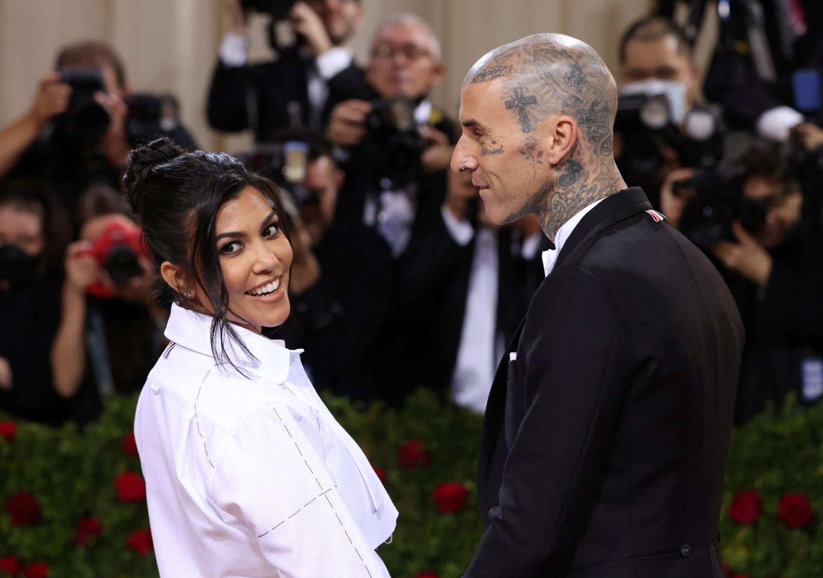 kourtney-kardashian-and-travis-barker-welcome-first-child-together,-reports-say